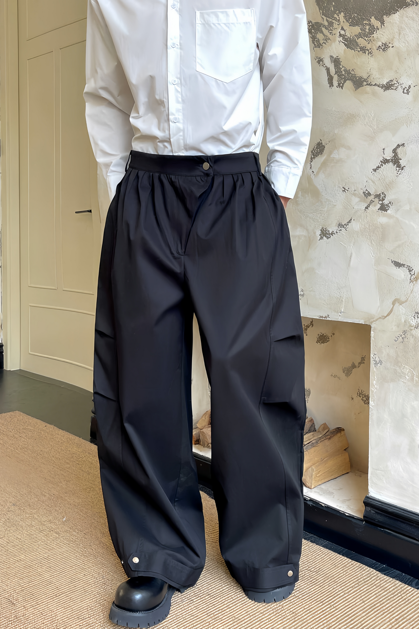 Pierre black pleated wide-leg trousers