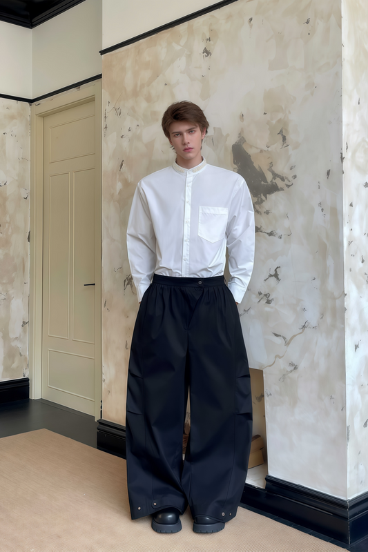 Pierre black pleated wide-leg trousers